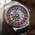 Silver wristwatch with a detailed face on a person's wrist