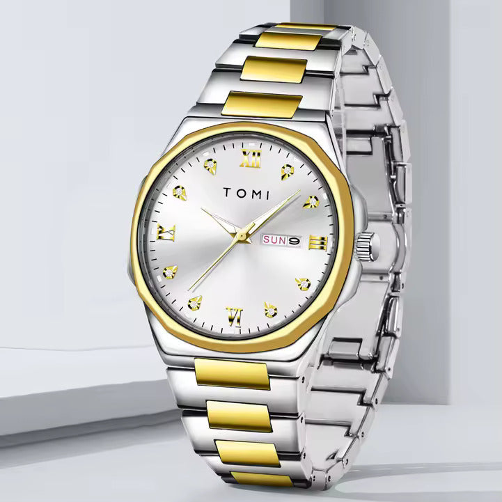 Silver and gold watch with 'TOMI' branding on a light gray background